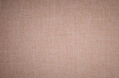 Dokulu arka plan yüzeyi Tekstil döşemelik mobilya yakın çekim. Bej renk kumaş yapısı