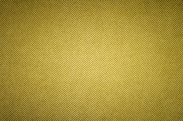 Getextureerde achtergrond oppervlak van textiel bekleding meubilair close-up. gele kleur stof structuur — Stockfoto