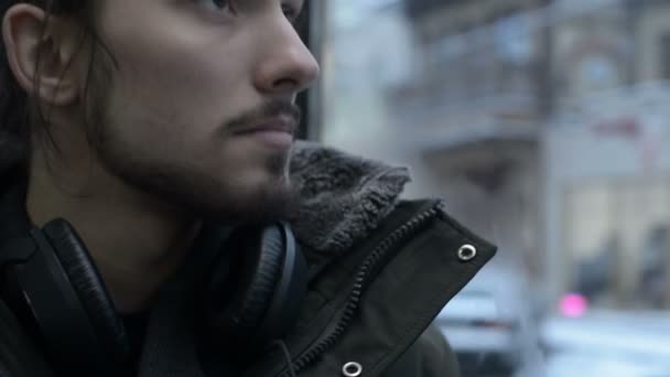 Close Portrait Young Long Haired Bearded Man Jacket Large Headphones — Stock Video