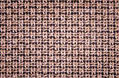 Dokulu arka plan yüzeyi Tekstil döşemelik mobilya yakın çekim. çuval bezi kahverengi renk kumaş yapısı