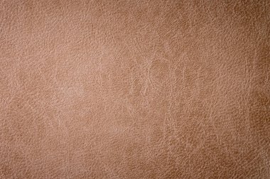 Dokulu arka plan yüzeyi deri döşeme mobilya yakın çekim. çuval bezi kahverengi renk kumaş yapısı