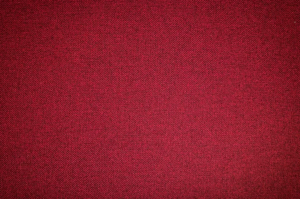 Dokulu arka plan yüzeyi Tekstil döşemelik mobilya yakın çekim. Kırmızı renk kumaş yapısı