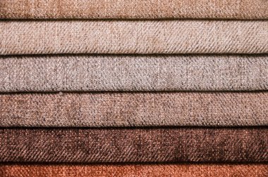 Mobilya ve giyim Döşeme renkli ve parlak kumaş örnekleri. Bir palet Tekstil soyut çizgiler farklı renkteki Close-up