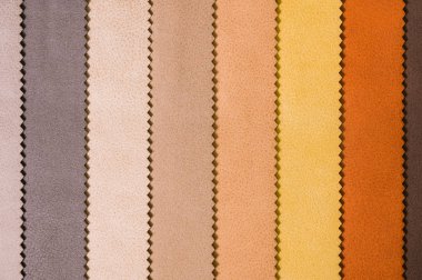 Renkli ve parlak kumaş deri mobilya ve giyim Döşeme örnekleri. Bir palet Tekstil soyut çizgiler farklı renkteki Close-up