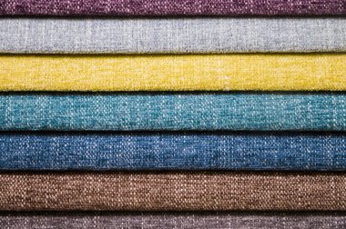 Mobilya ve giyim Döşeme renkli ve parlak kumaş örnekleri. Bir palet Tekstil soyut çizgiler farklı renkteki Close-up