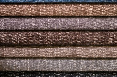 Mobilya ve giyim Döşeme renkli ve parlak kumaş örnekleri. Bir palet Tekstil soyut çizgiler farklı renkteki Close-up