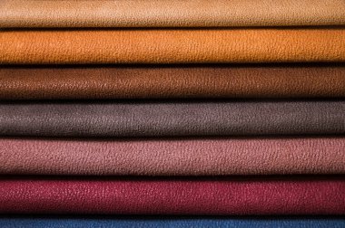 Mobilya ve giyim Döşeme renkli ve parlak kumaş örnekleri. Bir palet Tekstil soyut çizgiler farklı renkteki Close-up