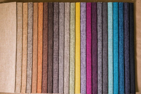 Colorful and bright fabric samples of furniture and clothing upholstery. Close-up of a palette of textile abstract stripes of different colors — Stock Photo, Image