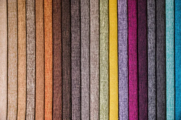 Colorful and bright fabric samples of furniture and clothing upholstery. Close-up of a palette of textile abstract stripes of different colors — Stock Photo, Image