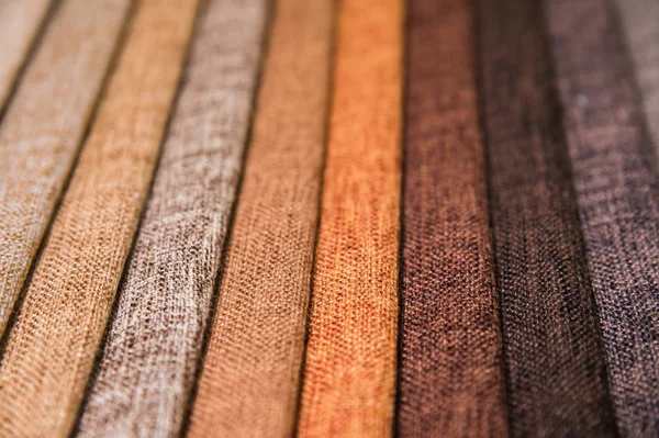 A set of samples of fabric furniture decoration lines of textile textures. Multicolored stripes upholstery. Mode and tone for a luxurious interior style. Abstract background — Stock Photo, Image