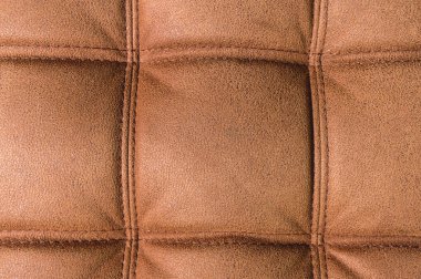 Odada bir pahalı kahverengi Tekstil kanepe bir parçası bir close-up