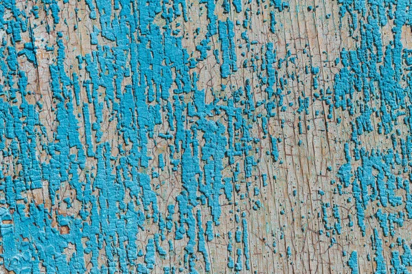 Stará a loupající se barva Postupem času se modrá barva odloupla od starých prken a dřevěná textura praskla. Ročník Abstraktní Grunge pozadí — Stock fotografie
