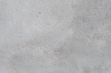 Gri desenli çimento duvar arkaplanı ve ince beton parçaları. İnşaat geçmişleri