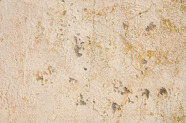 Fondo grunge de la pared de masilla pelada nube agrietada en tonos beige — Foto de Stock