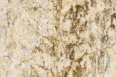 Çatlak bulut kabuğu soyulmuş bej renkli macun duvarın Grunge arka planı