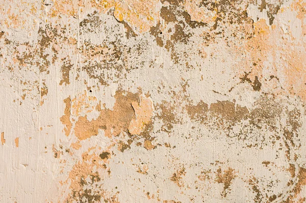 Fondo grunge de la pared de masilla pelada nube agrietada en tonos beige — Foto de Stock