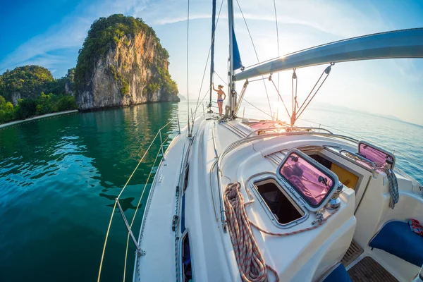 Young Woman Relaxes Bow Yacht Anchored Calm Lagoon Front Tropical — Stock Photo, Image