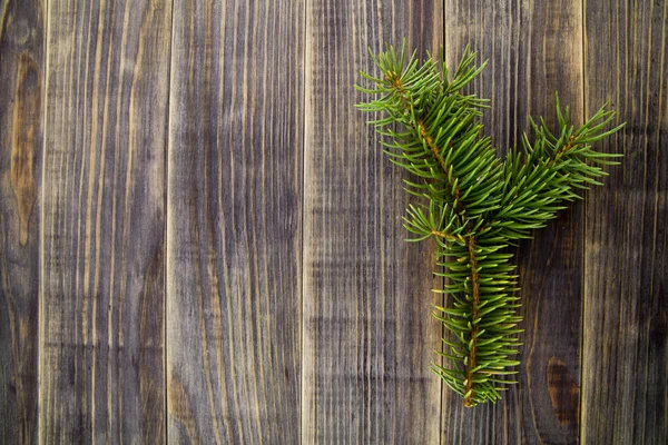 Rama Árbol Navidad Sobre Fondo Madera —  Fotos de Stock