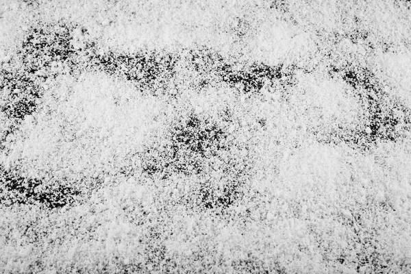 黒い背景に白い雪 — ストック写真