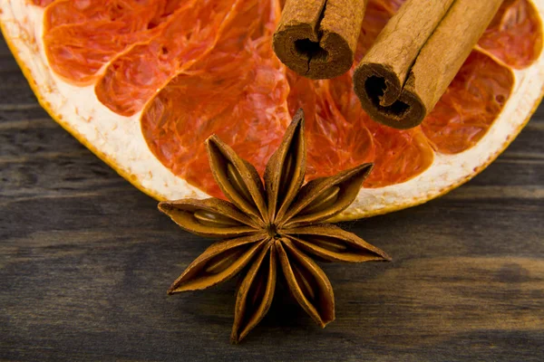 Dried Grapefruit Cinnamon Sticks Anise Stars Wooden Background — Stock Photo, Image