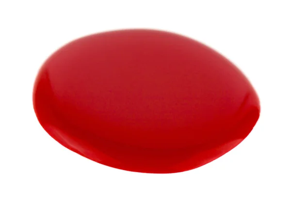 Blot röd nagellack isolerad på vit bakgrund närbild — Stockfoto
