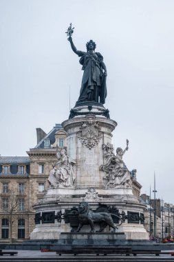 Marianne statue, national symbol of the French Republic at Place de la Republique in Paris, France clipart