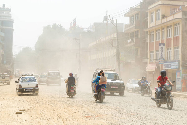 Traffic and dust at Boudha Road in Kathmandu, Nepal