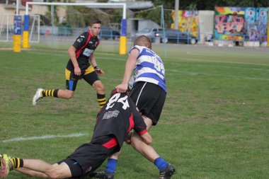 Odessa, Ukrayna - 29 Eylül 2018: Final Oyunları Şampiyonası Ukrayna'nın en güçlü takımları Rugby-7. Rugby topu alan üzerinde. Rugby topu için ağır mücadele sahip. Takım sporcular oyuncular sahada