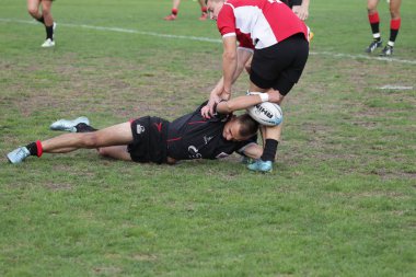 Odessa, Ukrayna - 29 Eylül 2018: Final Oyunları Şampiyonası Ukrayna'nın en güçlü takımları Rugby-7. Rugby topu alan üzerinde. Rugby topu için ağır mücadele sahip. Takım sporcular oyuncular sahada