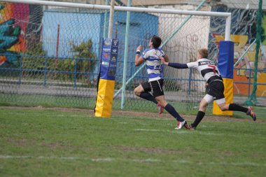 Odessa, Ukrayna - 29 Eylül 2018: Final Oyunları Şampiyonası Ukrayna'nın en güçlü takımları Rugby-7. Rugby topu alan üzerinde. Rugby topu için ağır mücadele sahip. Takım sporcular oyuncular sahada