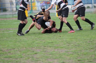 Odessa, Ukrayna - 29 Eylül 2018: Final Oyunları Şampiyonası Ukrayna'nın en güçlü takımları Rugby-7. Rugby topu alan üzerinde. Rugby topu için ağır mücadele sahip. Takım sporcular oyuncular sahada