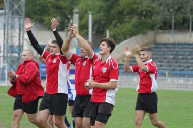 Odessa, Ukrayna - 29 Eylül 2018: Final Oyunları Şampiyonası Ukrayna'nın en güçlü takımları Rugby-7. Rugby topu alan üzerinde. Rugby topu için ağır mücadele sahip. Takım sporcular oyuncular sahada