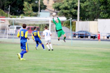 Spor arka plan bulanıklık. Futbol spor poster için zemin olarak bokeh muhteşem oyunu. Futbol oyun tipik sahne arka plan olmadan ekran arka planı için odak bulanık