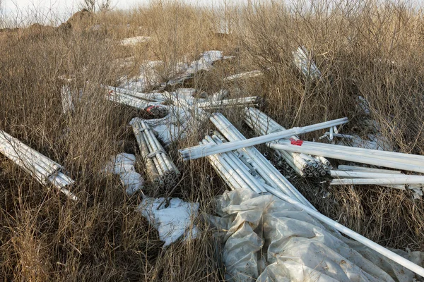 Ecological problem, disaster. Criminal disposal of fluorescent mercury lamps, E-waste. Environmental pollution. Ecological crime. Dirty broken fluorescent lamps, old fluorescent lamp dangerous rubbish