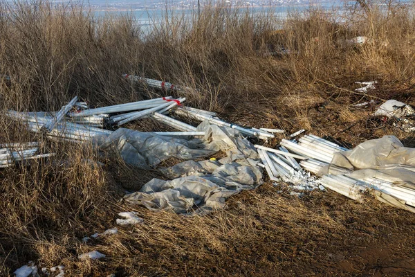 Ecological problem, disaster. Criminal disposal of fluorescent mercury lamps, E-waste. Environmental pollution. Ecological crime. Dirty broken fluorescent lamps, old fluorescent lamp dangerous rubbish