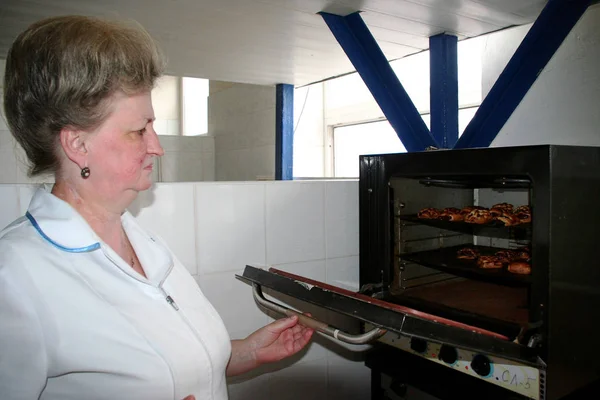 Odessa, Ukraine - July 7, 2007: The factory for the production of food from natural Ingredients. Food Convenience food. Production of dumplings, pancakes. Baking food products.