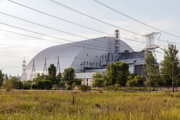  Reactor 4 at the Chernobyl nuclear power plant with a new confinement. Global atomic disaster. Chernobyl Exclusion Zone