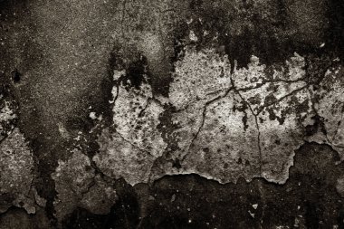 Alçı tuğla duvarın boş eski sanat dokusu. Yaprak dokusuyla boyanmış taş tuğla duvarın çatlaklarıyla kötü çizilmiş yüzey. Hasarlı alçıyla binanın ön cephesini ovaladım.