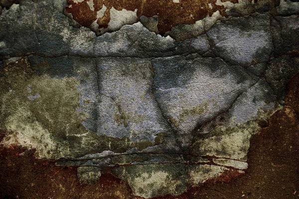 예술적 감촉이 갈라진 긁히지 표면을 그린다 석고가 건물의 전면을 문지르다 — 스톡 사진