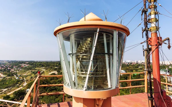 lighthouse lamp / glass large lamp at the sea lighthouse, a large light source, an industrial lighthouse for sailors, Odessa. Signal lamp close-up on top of light house building