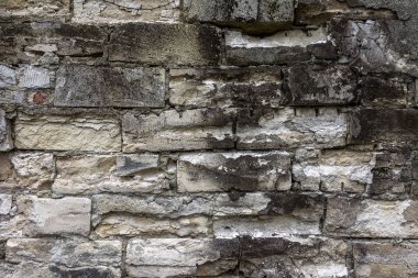 Doğal taştan örülmüş duvar. arka plan olarak kullanılabilir