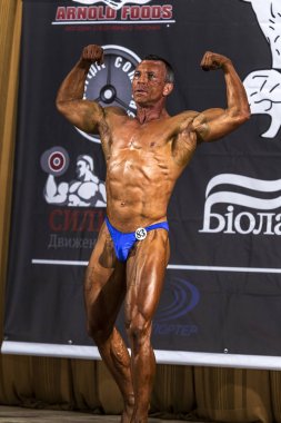 Odessa, Ukrayna - 12 Ekim 2014: Ukrayna 'da erkek ve kadınların vücut geliştirme sporu kategorisi, Ukrayna' nın 12 Ekim 2014. 