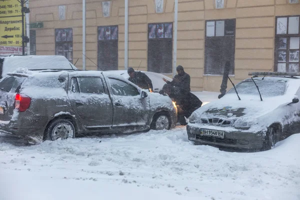 Odessa, Ukraine - December 29, 2014: Natural disasters, snow storm with heavy snow paralyzed the city. Kolaps. Snow covered the cyclone Europe, December 29, 2014 in Odessa, Ukraine.