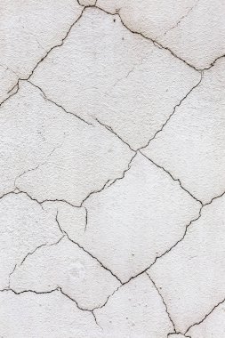 Güzel eski duvar büyük çatlaklar ve doku ile. Arka plan olarak kullanılabilir