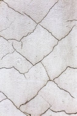 Güzel eski duvar büyük çatlaklar ve doku ile. Arka plan olarak kullanılabilir