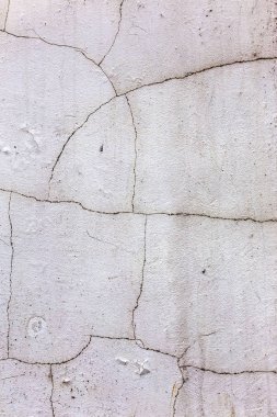 Güzel eski duvar büyük çatlaklar ve doku ile. Arka plan olarak kullanılabilir