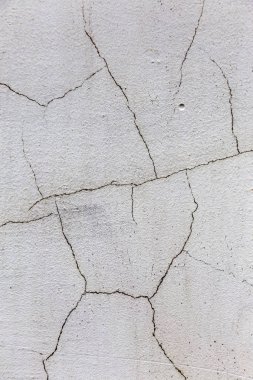 Güzel eski duvar büyük çatlaklar ve doku ile. Arka plan olarak kullanılabilir