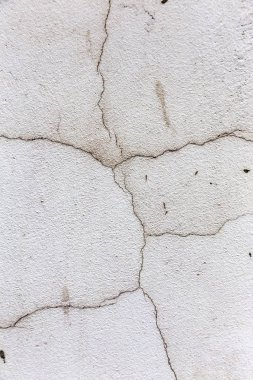 Güzel eski duvar büyük çatlaklar ve doku ile. Arka plan olarak kullanılabilir