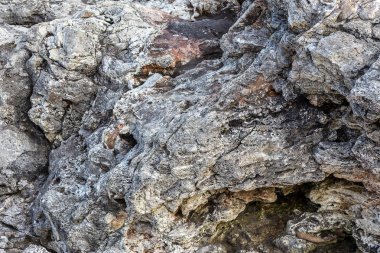 Taş dokulu arka plan. Volkanik kaya doku. Yaratıcı tasarım için temel arka plan olarak. astar arka plan