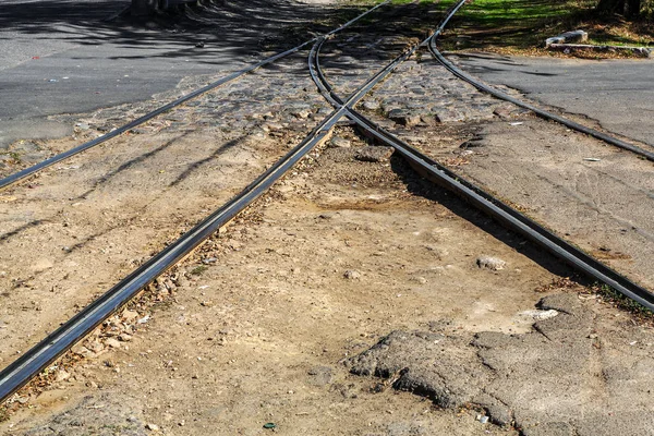 Very bad paved road. Cracks in the pavement, potholes. Very poor condition of local asphalt road after a low-quality patching